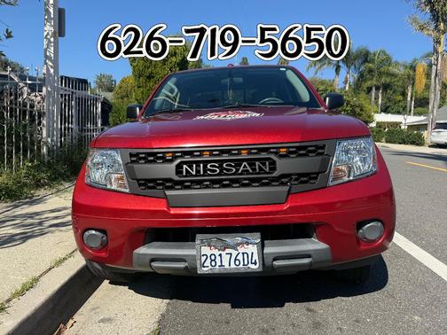 Red 2018 Nissan Frontier SV