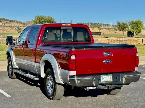 Red 2014 Ford F-250 Lariat