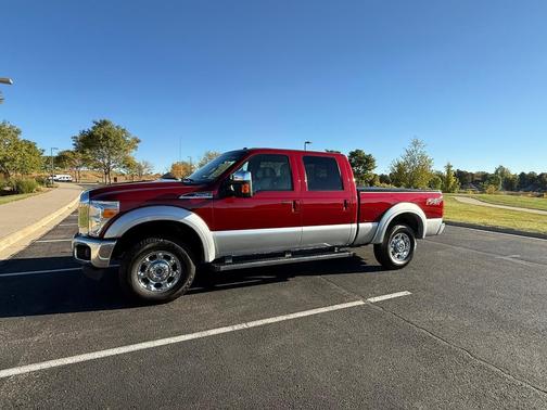 Red 2014 Ford F-250 Lariat