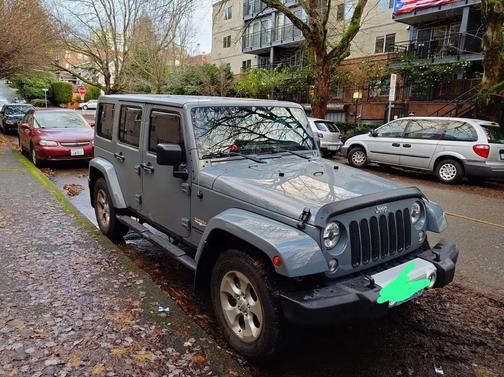 Gray 2014 Jeep Wrangler Unlimited Sahara