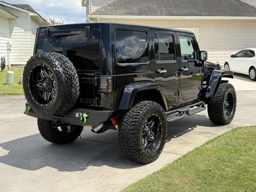 Black 2012 Jeep Wrangler Unlimited Sahara