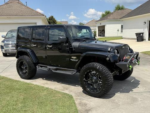 Black 2012 Jeep Wrangler Unlimited Sahara