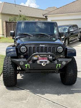 Black 2012 Jeep Wrangler Unlimited Sahara