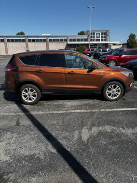 Orange 2017 Ford Escape SE