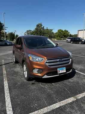 Orange 2017 Ford Escape SE