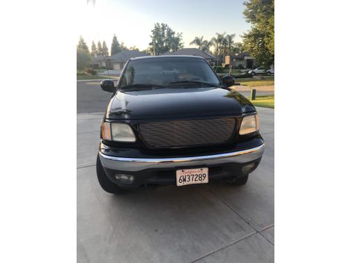 Photo 4 of 9 of 2002 Ford F-150 Lariat SuperCrew