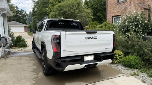 White 2025 GMC Sierra EV Max Range Denali