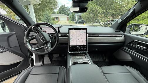 White 2025 GMC Sierra EV Max Range Denali