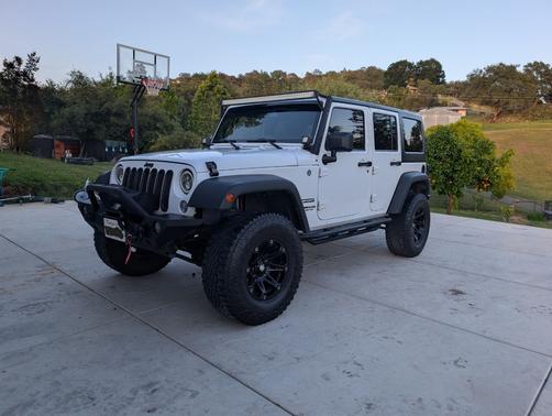 White 2014 Jeep Wrangler Unlimited Sport