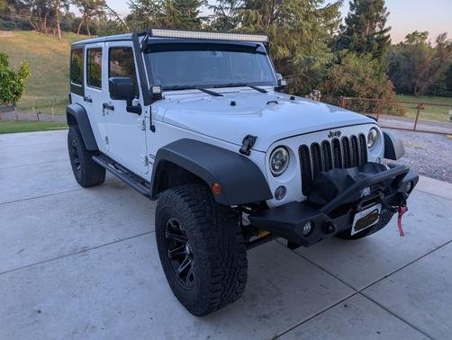 White 2014 Jeep Wrangler Unlimited Sport