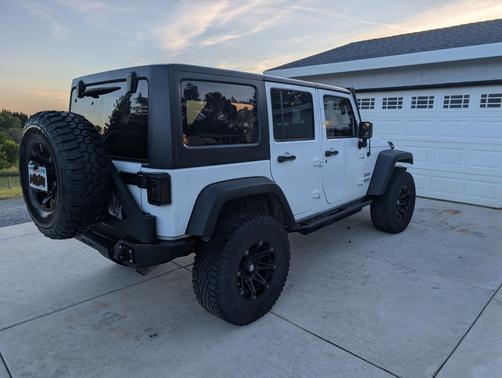 White 2014 Jeep Wrangler Unlimited Sport