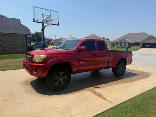 Red 2010 Toyota Tacoma Access Cab