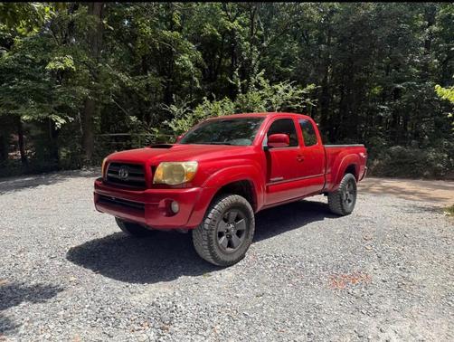 Red 2010 Toyota Tacoma Access Cab