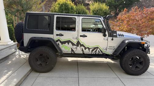 Gray 2015 Jeep Wrangler Unlimited Sport