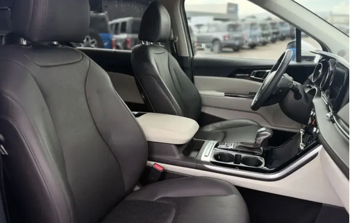 Black 2024 Kia Carnival EX