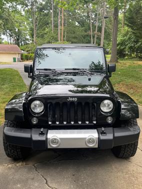 Black 2014 Jeep Wrangler Sahara