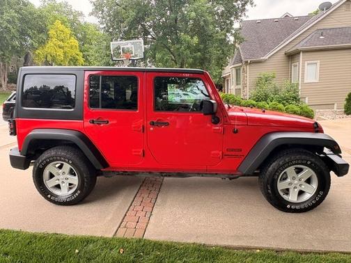 Red 2016 Jeep Wrangler Unlimited Sport