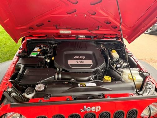 Red 2016 Jeep Wrangler Unlimited Sport