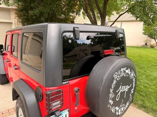 Red 2016 Jeep Wrangler Unlimited Sport