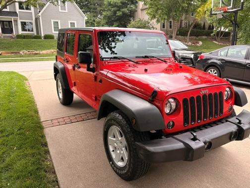 Red 2016 Jeep Wrangler Unlimited Sport
