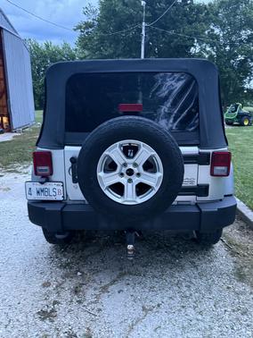 Silver 2011 Jeep Wrangler Unlimited Sport