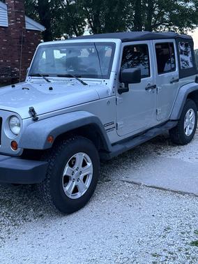 Silver 2011 Jeep Wrangler Unlimited Sport