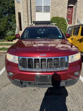 Red 2012 Jeep Grand Cherokee Laredo
