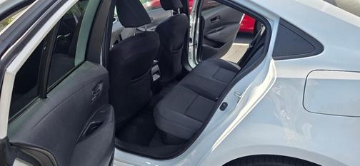 White 2025 Toyota Corolla Hybrid LE