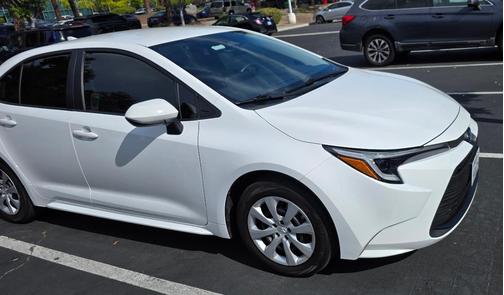 White 2025 Toyota Corolla Hybrid LE