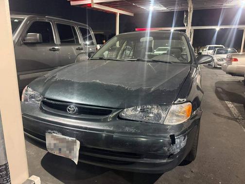 Green 1999 Toyota Corolla LE