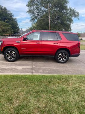 Red 2025 GMC Yukon AT4