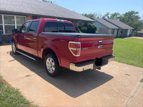 Red 2011 Ford F-150 Lariat