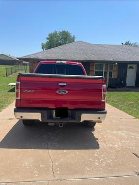 Red 2011 Ford F-150 Lariat