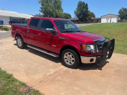 Red 2011 Ford F-150 Lariat