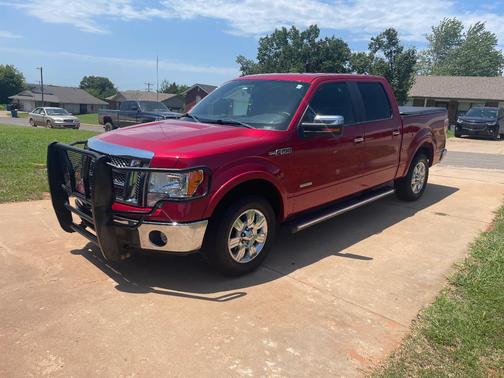Red 2011 Ford F-150 Lariat