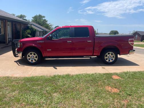 Red 2011 Ford F-150 Lariat