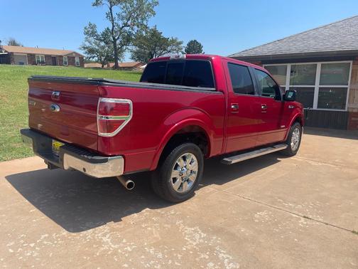 Red 2011 Ford F-150 Lariat