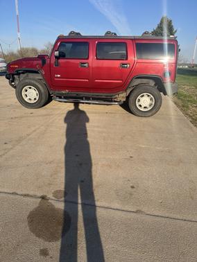 Red 2004 Hummer H2 Base