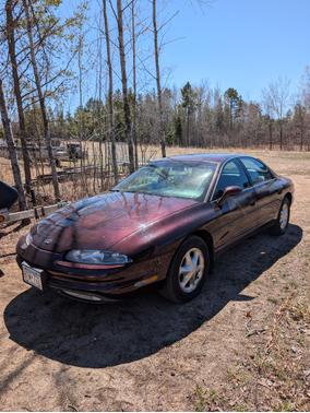 Red 1995 Oldsmobile Aurora Base