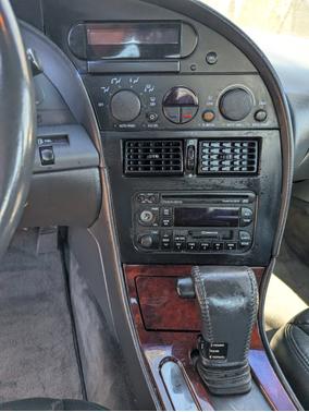 Red 1995 Oldsmobile Aurora Base