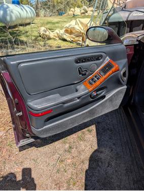 Red 1995 Oldsmobile Aurora Base
