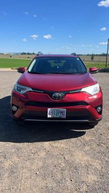 Red 2018 Toyota RAV4 XLE