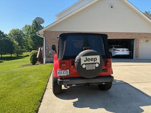 Red 2003 Jeep Wrangler X