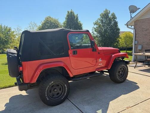 Red 2003 Jeep Wrangler X