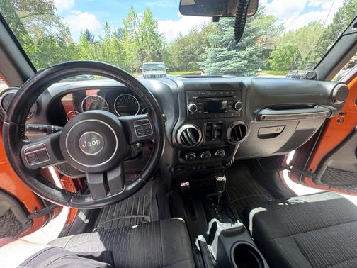 Orange 2011 Jeep Wrangler Unlimited Sport
