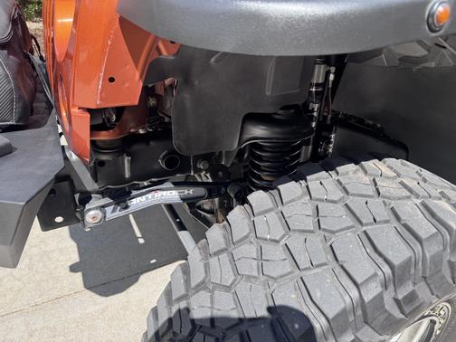Orange 2011 Jeep Wrangler Unlimited Sport