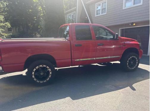 Red 2006 Dodge Ram 1500 Laramie Quad Cab