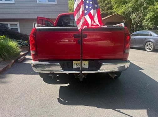 Red 2006 Dodge Ram 1500 Laramie Quad Cab