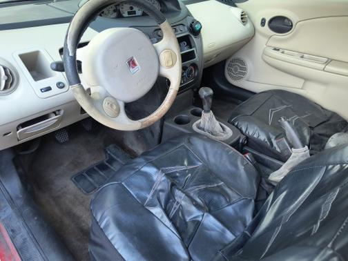 Red 2003 Saturn Ion 3