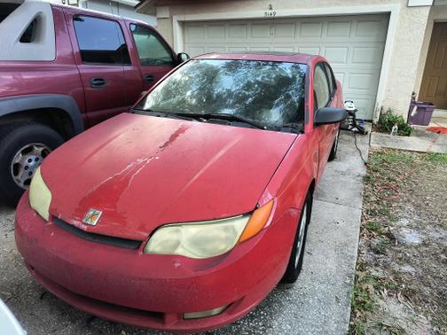 Red 2003 Saturn Ion 3